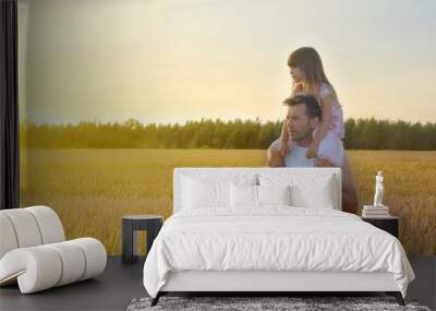 Father with his daughter in wheat field Wall mural