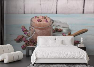 Homemade spa of rose bath salts on a light wooden background. Cosmetics and natural medicine Wall mural