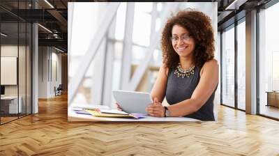 african american woman with tablet, smiling to camera Wall mural