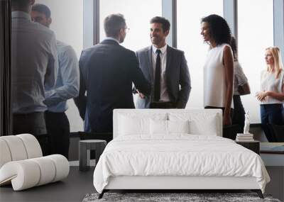 businesspeople shaking hands before meeting in boardroom Wall mural