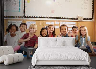 Elementary school kids sitting on classroom floor Wall mural