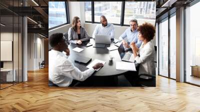 elevated view of corporate business colleagues talking in a meeting room Wall mural