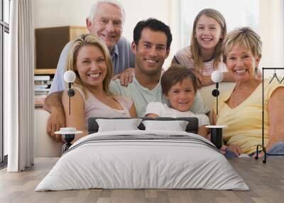 extended family in living room smiling Wall mural