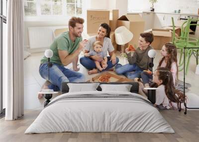 Family Celebrating Moving Into New Home With Pizza Wall mural