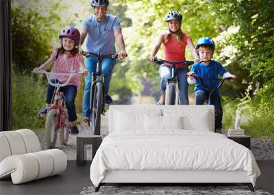 Family On Cycle Ride In Countryside Wall mural