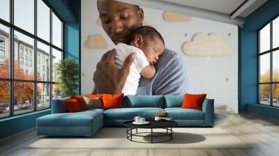 Father Holding Newborn Baby Son In Nursery Wall mural