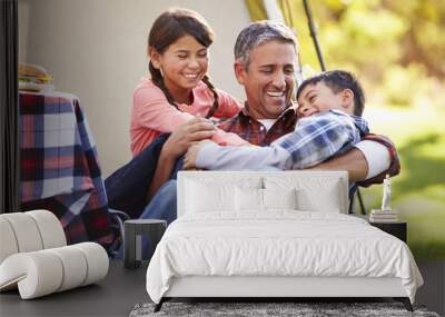 Father With Children Enjoying Camping Holiday In Countryside Wall mural