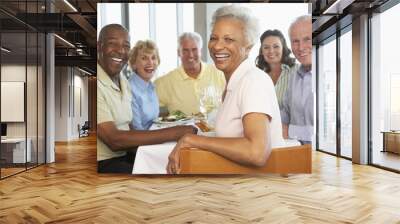 Friends Having Lunch Together At A Restaurant Wall mural