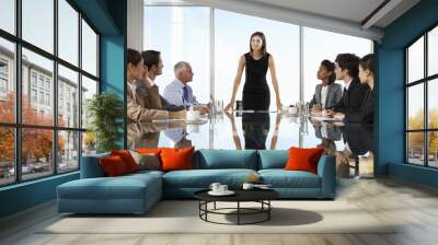 group of business people having board meeting around glass table Wall mural