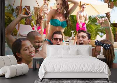 Group Of Friends Having Party In Pool Drinking Champagne Wall mural