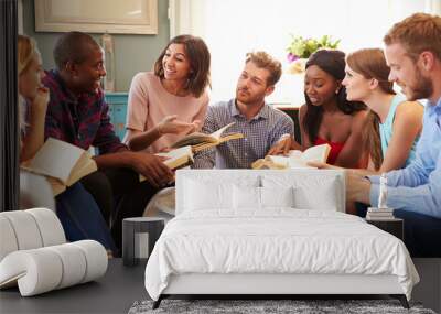 Group Of Friends Taking Part In Book Club At Home Wall mural