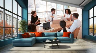 group of medical staff meeting around table in hospital Wall mural