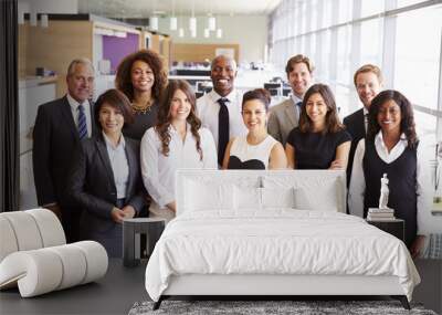 Group portrait of a team of smiling office coworkers Wall mural