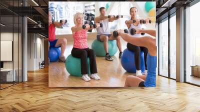 Instructor Taking Exercise Class At Gym Wall mural