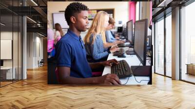 Line Of Teenage High School Students Studying In Computer Class Wall mural