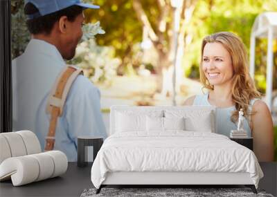 Mailman Delivering Letters To Woman Wall mural