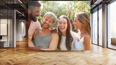 Male And Female Gay Friends At Home Having Party In Garden Together Wall mural