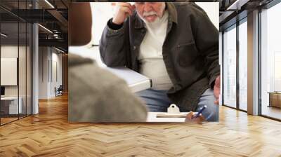 Man Talking To Counsellor Who Takes Notes Wall mural