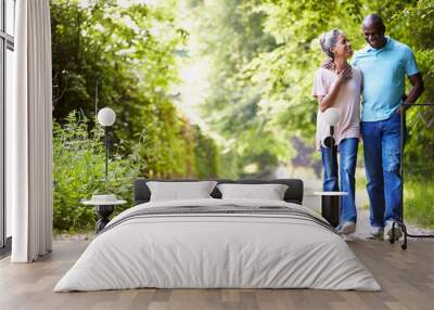 mature african american couple walking in countryside Wall mural