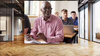 Mature Student Using Digital Tablet In Adult Education Class Wall mural