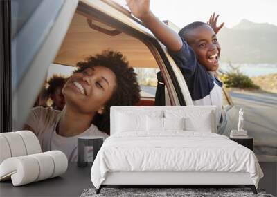 Mother And Children Relaxing In Car During Road Trip Wall mural