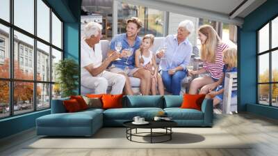 Multi Generation Family Enjoy Outdoor Drinks And Snacks At Home Wall mural