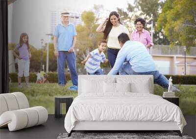 Multi Generation Family Playing Soccer Together Wall mural