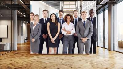 Office workers in a modern lobby, group portrait Wall mural