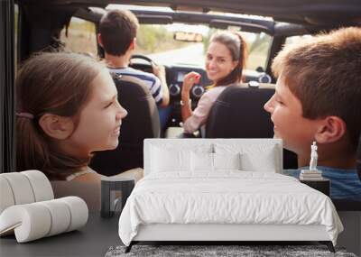 Parents Taking Children On Trip In Open Top Car Wall mural