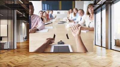 point of view shot of businesspeople around boardroom table Wall mural