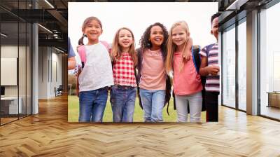 Portrait Of Excited Elementary School Pupils On Playing Field At Break Time Wall mural