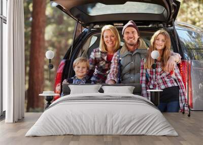 Portrait of family by their car before hiking, California Wall mural