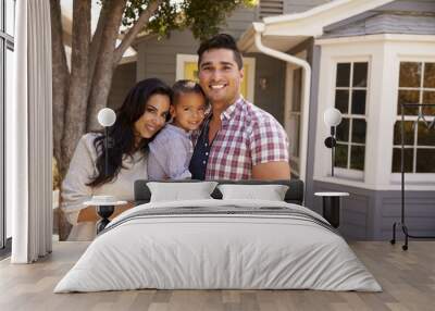 Portrait Of Family Standing Outside Home Wall mural