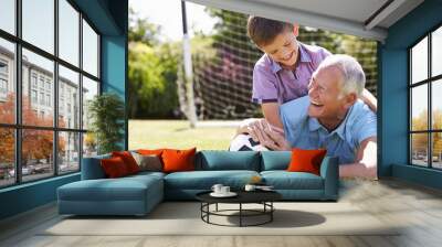 Portrait Of Grandfather And Grandson With Football Wall mural