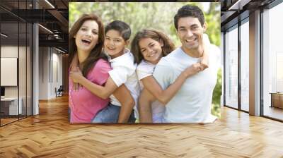 Portrait of Happy Family In Park Wall mural