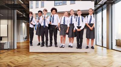 Portrait Of High School Student Group Wearing Uniform Standing Outside School Buildings Wall mural