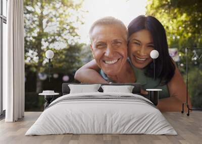 Portrait Of Loving Mature Couple In Back Yard Garden Wall mural