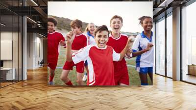 Portrait Of Male And Female High School Soccer Teams Celebrating Wall mural