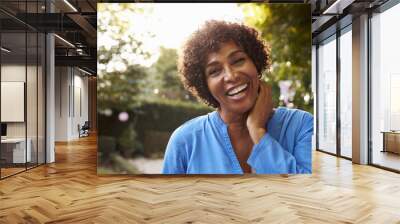 portrait of mature woman in back yard garden Wall mural