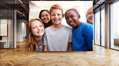 Portrait Of Smiling Male And Female Students In Grade School Classroom Wall mural