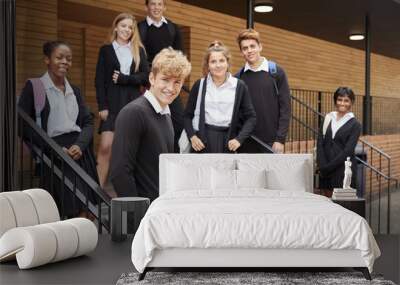 Portrait Of Teenage Students In Uniform Outside School Building Wall mural