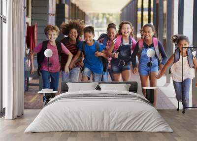 School kids running in elementary school hallway, front view Wall mural