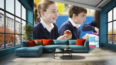 Schoolchildren Sitting At Table Eating Packed Lunch Wall mural