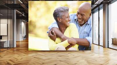 senior couple relaxing in autumn landscape Wall mural