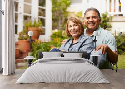 senior couple relaxing in garden Wall mural