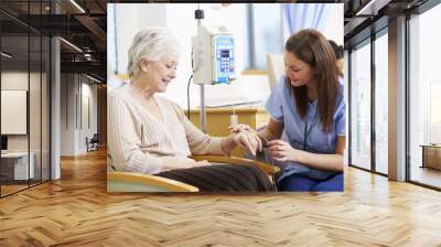 Senior Woman Undergoing Chemotherapy With Nurse Wall mural