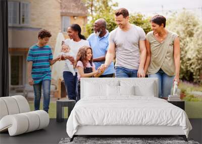 Smiling Multi-Generation Mixed Race Family In Garden At Home Together Wall mural