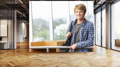 Teenage student boy indoors Wall mural