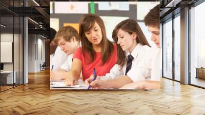 Teenage Students Studying In Classroom With Teacher Wall mural