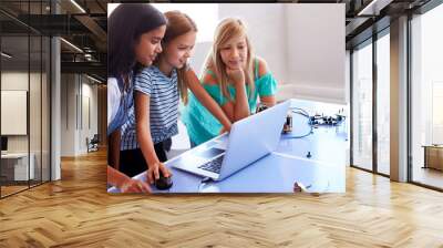 Three Female Students Building And Programing Robot Vehicle In After School Computer Coding Class Wall mural